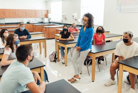 teaching-high-school-students-during-covid-19-istock-1264747482